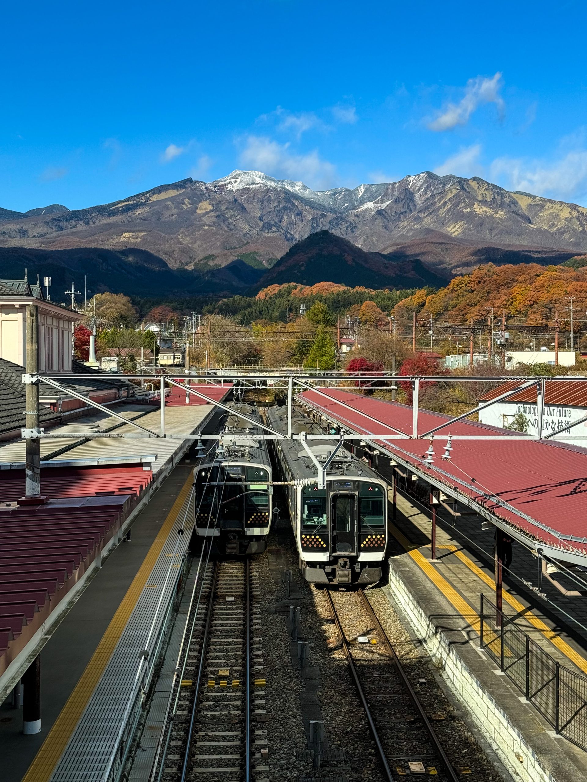 One of the most scenic train stations in Nikko, Japan lined with mountains at the back